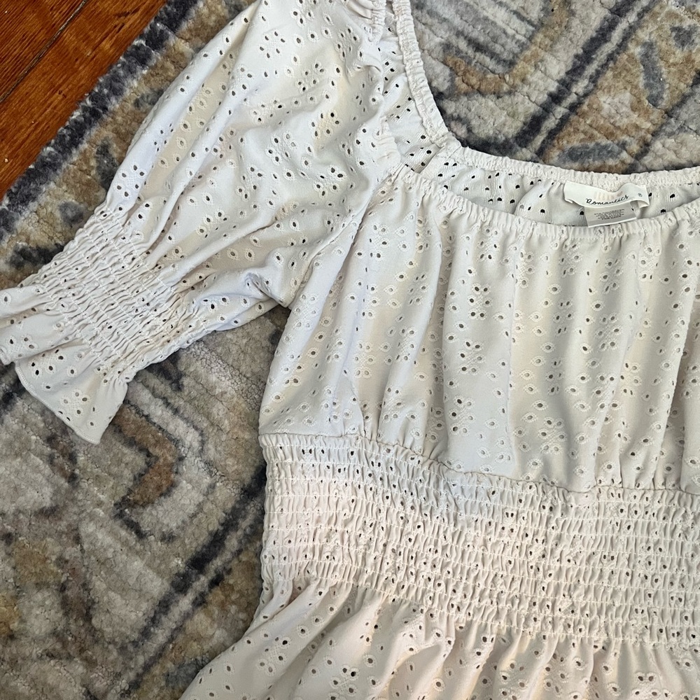 Islet peplum white top